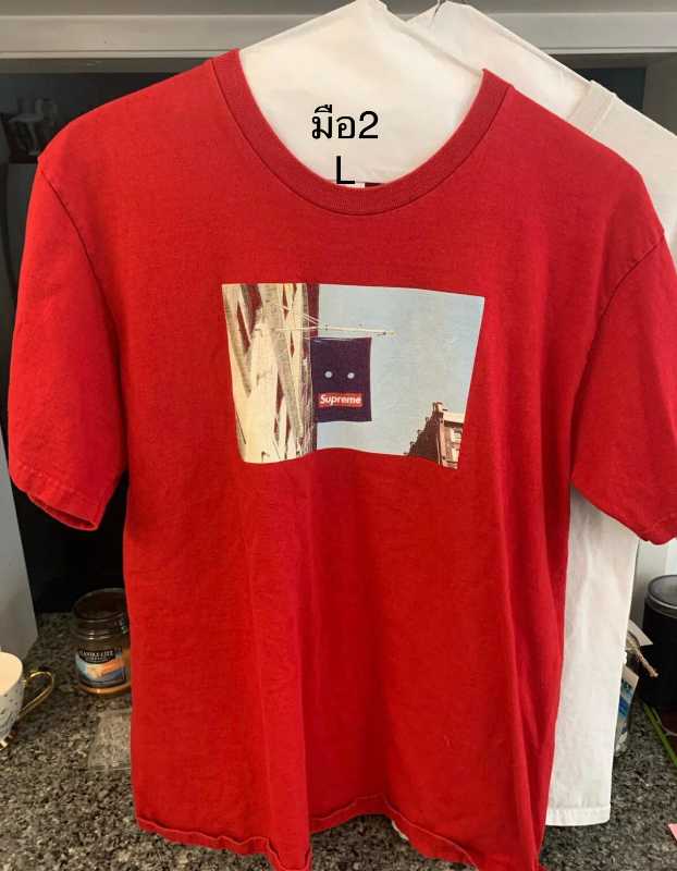 Supreme banner hot sale tee red