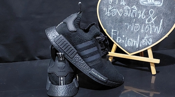 Triple black nmd clearance japan