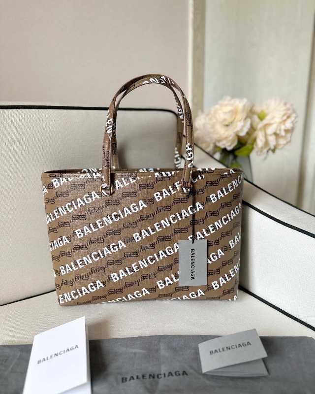 Balenciaga signature medium east-west shopper bag bb monogram coated canvas  in beige-Via Manzoni