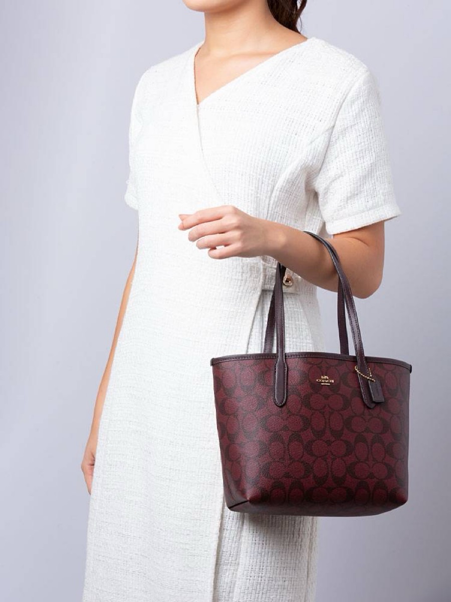 Zip Tote Town Tote In Signature Canvas Coach City Zip Tote Oxblood