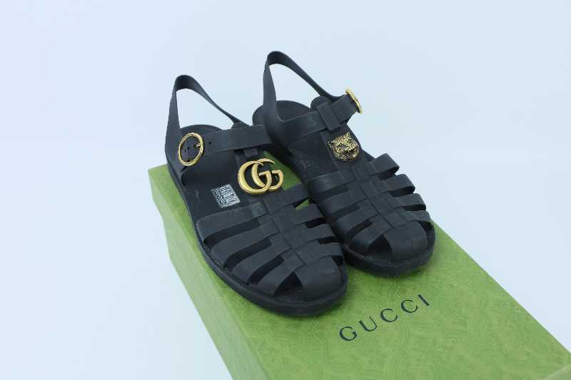 Buy & Sell Gucci Rubber Buckle Strap Sandals Black | SASOM