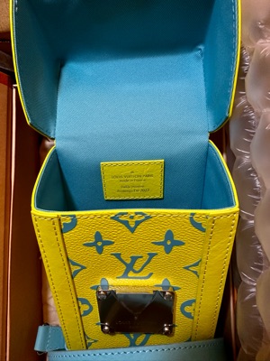 Louis Vuitton Vertical Trunk Wearable Wallet Yellow/Light Blue M82007 Monogram Playground Canvas