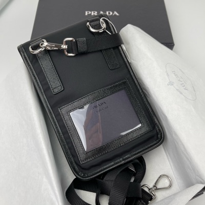 Shop PRADA Re-Nylon and Saffiano leather smartphone case  (2ZH108_2DMH_F0005) by Sunflower.et