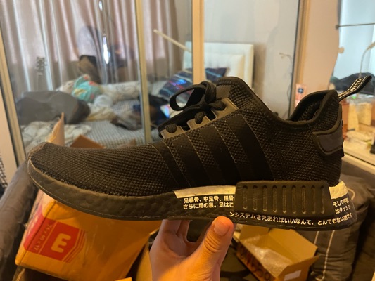 Triple black nmd on sale japan