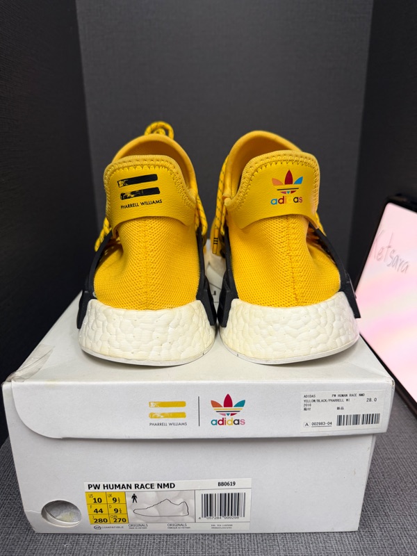 Buy & Sell Adidas NMD HU Pharrell Human Race Yellow | SASOM