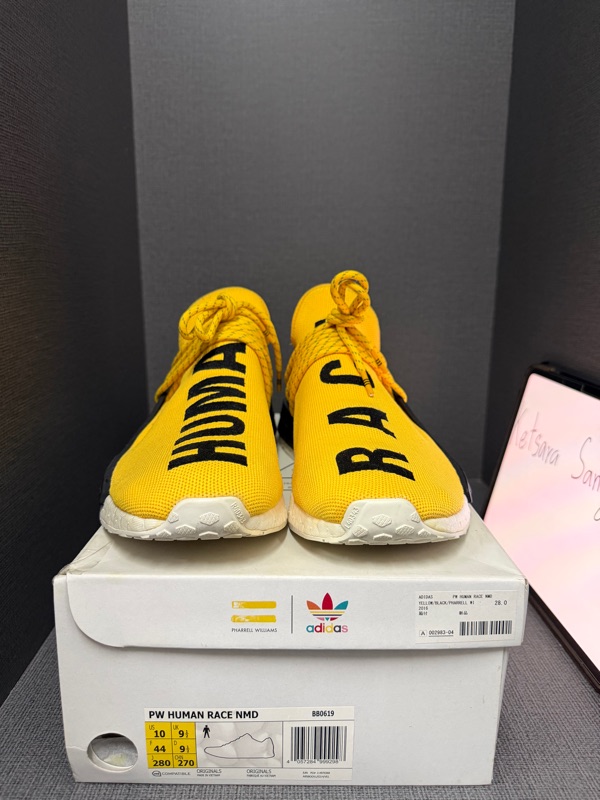 Buy & Sell Adidas NMD HU Pharrell Human Race Yellow | SASOM