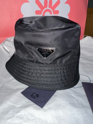 Prada Re-Nylon Bucket Hat With Enameled Metal Triangle Logo