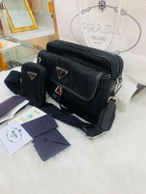 Shop PRADA RE NYLON Re-Nylon and Saffiano leather shoulder bag  (2VH160_2DMH_F0002_V_OOO) by SHACKLE