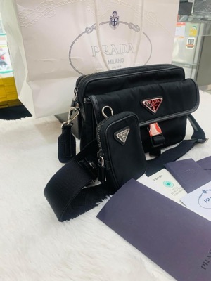Shop PRADA RE NYLON Re-Nylon and Saffiano leather shoulder bag  (2VH160_2DMH_F0002_V_OOO) by Pohutukawa